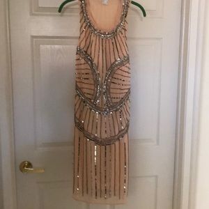 Blush sequin cocktail dress. Simi backless.